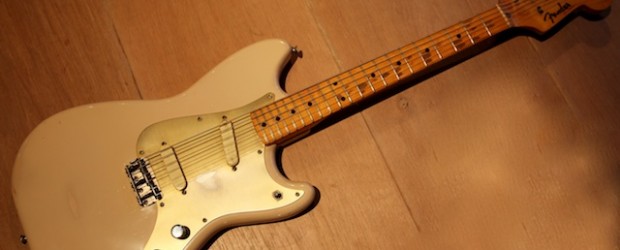 This is a vintage Fender Duosonic from 1956. Very nice Desert Sand color. It has an incredible V-shaped neck.