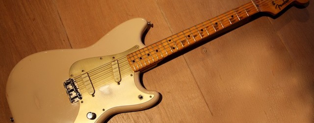 This is a vintage Fender Duosonic from 1956. Very nice Desert Sand color.