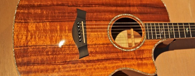 Taylor K24-CE, 2007. This is made of KOA. It looks astounding. It sounds quite good too.